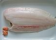 Schrat&acute;s Rotzunge auf der Gr&auml;te gebraten