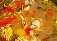 Kambodschanische Fischsuppe mit Ananas und Sojasprossen