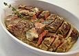 Lammlachs im eigenen Jus mit jungen Kartoffeln, provencalisch