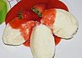 Topfenkn&ouml;del mit Erdbeersauce
