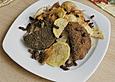Blutwurst auf Krautsockel mit Kartoffelchips