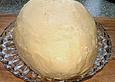 Orangen - Weincremetorte in Eiform