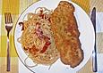 Schnitzel mit einer Parmesan - Thymian - Panade mit Rosmarinkartoffeln