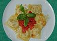 Ravioli mit Lachsf&uuml;llung an warmem Tomaten&ouml;l