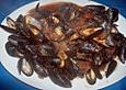Venusmuscheln mit Tomaten