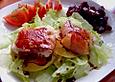 Ziegenk&auml;se im Schinkenmantel mit Honig - Mandel - Vinaigrette