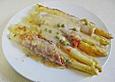 &Uuml;berbackener Spargel im Schinkenmantel