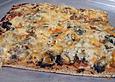 Pizza mit Fisch und Spinat