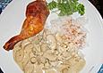 H&auml;hnchenschenkel mit Reis und Kartoffeln