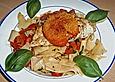 &Uuml;berbackenes H&uuml;hnerbrustfilet mit karamellisierten Tomaten
