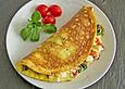 Omelette mit Blattspinat und Tomaten