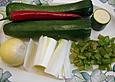 Rotbarsch mit Zucchinistreifen und glasierten M&ouml;hren in Zucchinisauce