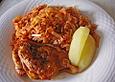 Kr&auml;uterhuhn auf Tomatenkraut
