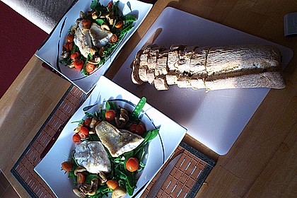 Gebratenes Welsfilet auf Zuckerschoten, Rucola und Champignons 6
