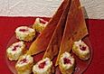 Milchreis - Sushi mit Himbeeren im Nussmantel