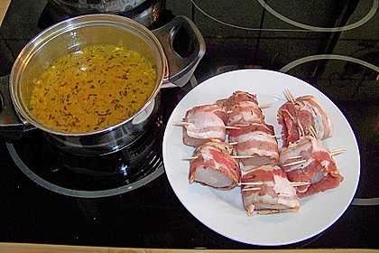 Jakobsmuscheln im gekr&auml;uterten Speckmantel mit Safran - Orangensauce