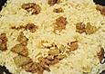 Seitan und Zwiebeln mit Reis