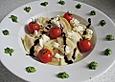 Ravioli mit Tomaten - Mozzarella F&uuml;llung, Basilikum-Pesto und Crema All&acute; Aceto Balsamico