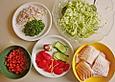 Alaska Heilbutt an Tomatenfilets und Zucchinigratin