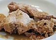 Kaninchen in Zwiebelsauce