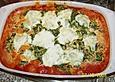 Kabeljau mit Spinat - Mozzarellakruste auf Tomatenso&szlig;e