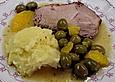 Schweinebraten mit Orangen und Oliven
