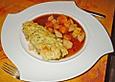 Andalusisches Steak mit Erd&auml;pfelmantel an tropischer Fruchtsauce