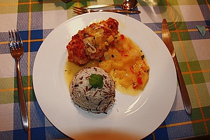 H&auml;hnchenfilets mit Erdnusskruste in Orangensauce