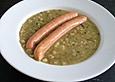 Gr&uuml;ne Erbsensuppe mit Speck