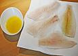 Gegrillter Fisch in Zitronenbutter