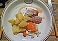 Schweine - Kr&auml;uterfilet mit Speckmantel in Weinsauce
