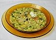 Pikante Zucchinisuppe mit Reis und Limone