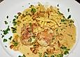 Schweinemedallions im Parmaschinkenmantel mit Steinpilz - Gorgonzola - Sauce