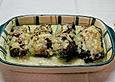&Uuml;berbackene Wirsingrollen mit Feta