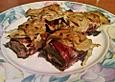 &Uuml;berbackenes Schweinefilet mit Zwiebel - Senf - Kruste