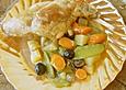 Kaninchen mit Gem&uuml;se und Oliven in Senfso&szlig;e