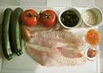 Rotbarschfilet auf Zucchini - Tomaten - Oliven - Kompott mit Chilireis
