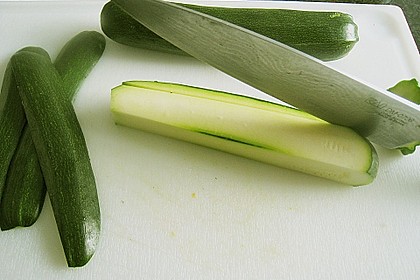 Rotbarschfilet auf Zucchini - Tomaten - Oliven - Kompott mit Chilireis 1