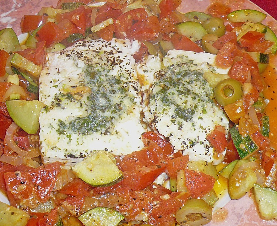 Feta (Schafskäse) auf Tomaten und Zwiebeln, in der Pfanne gebacken von ...