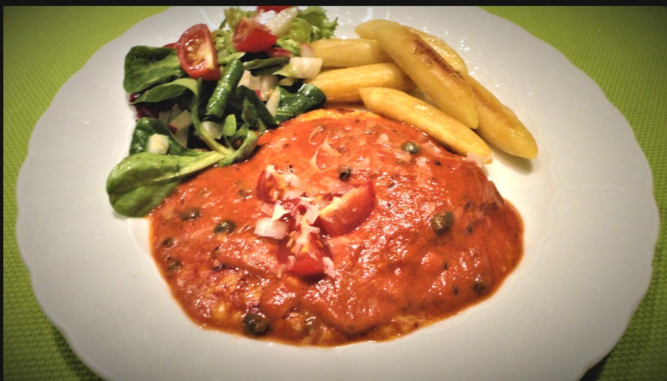 Überbackene Fischfilets in einer Kräuter - Tomatensoße von ...