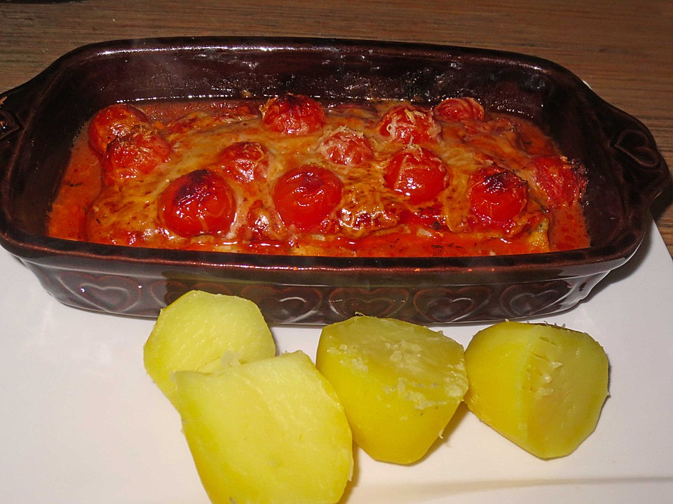 Überbackene Fischfilets in einer Kräuter - Tomatensoße von ...