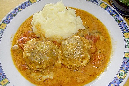 Gratinierte Hack - Laibchen in Tomaten - Champignon - Sauce 28