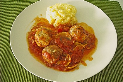 Gratinierte Hack - Laibchen in Tomaten - Champignon - Sauce 37