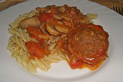 Gratinierte Hack - Laibchen in Tomaten - Champignon - Sauce 30
