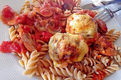 Gratinierte Hack - Laibchen in Tomaten - Champignon - Sauce 13