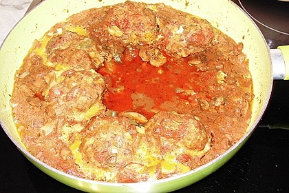 Gratinierte Hack - Laibchen in Tomaten - Champignon - Sauce 19