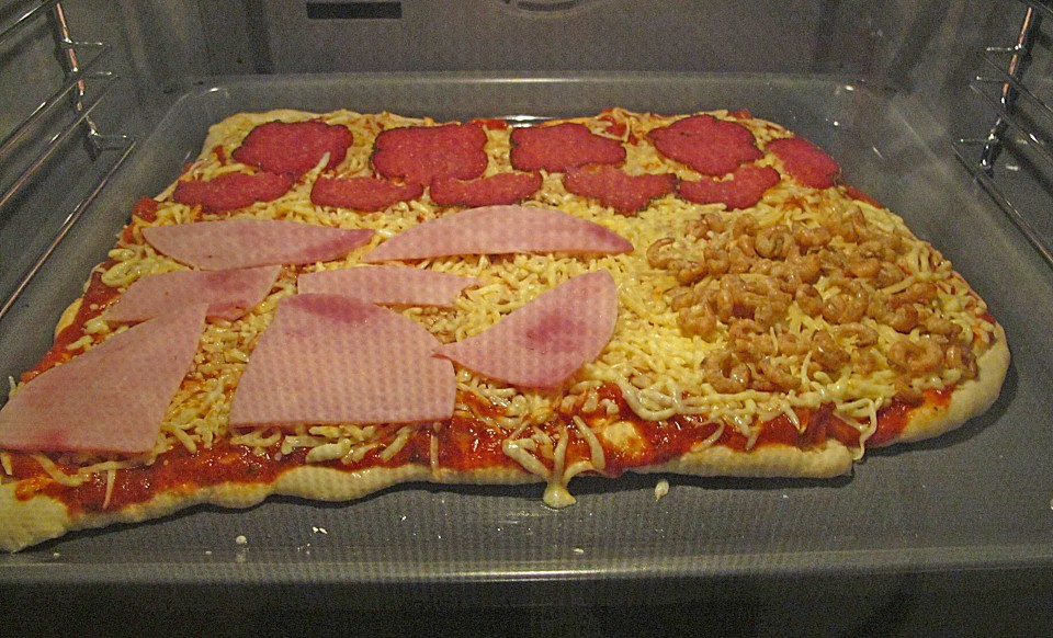 Pizza mit Tomaten, Schinken und Käse von Minister | Chefkoch.de