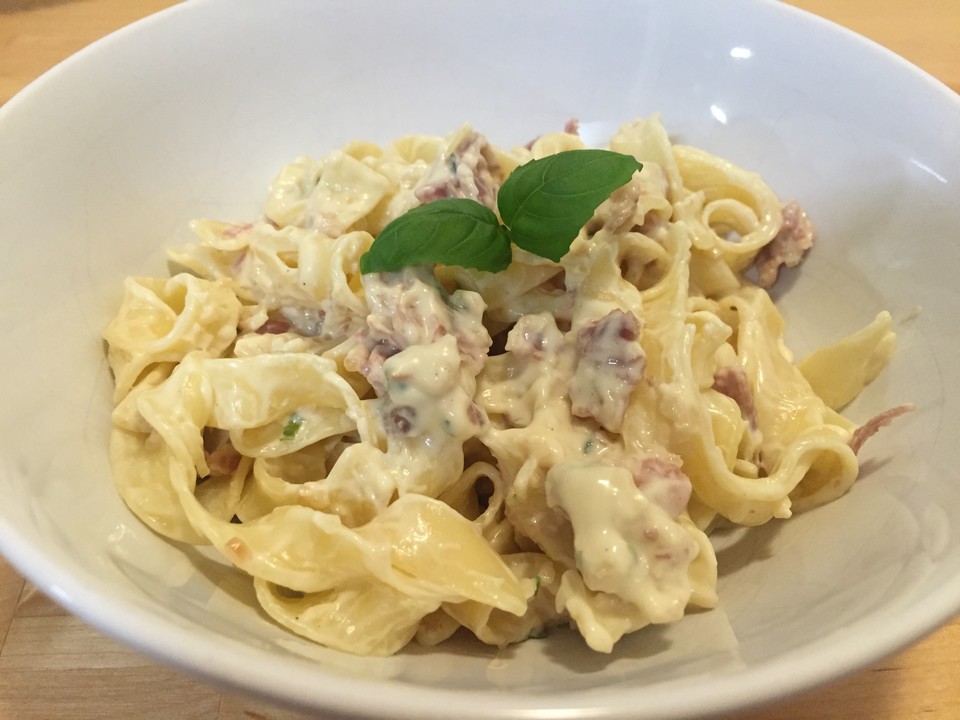 Patate ripiene al forno con formaggi e prosciutto cotto